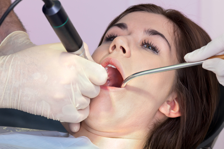 A woman receiving Periodontal Maintenance in Spokane Valley, WA 99206